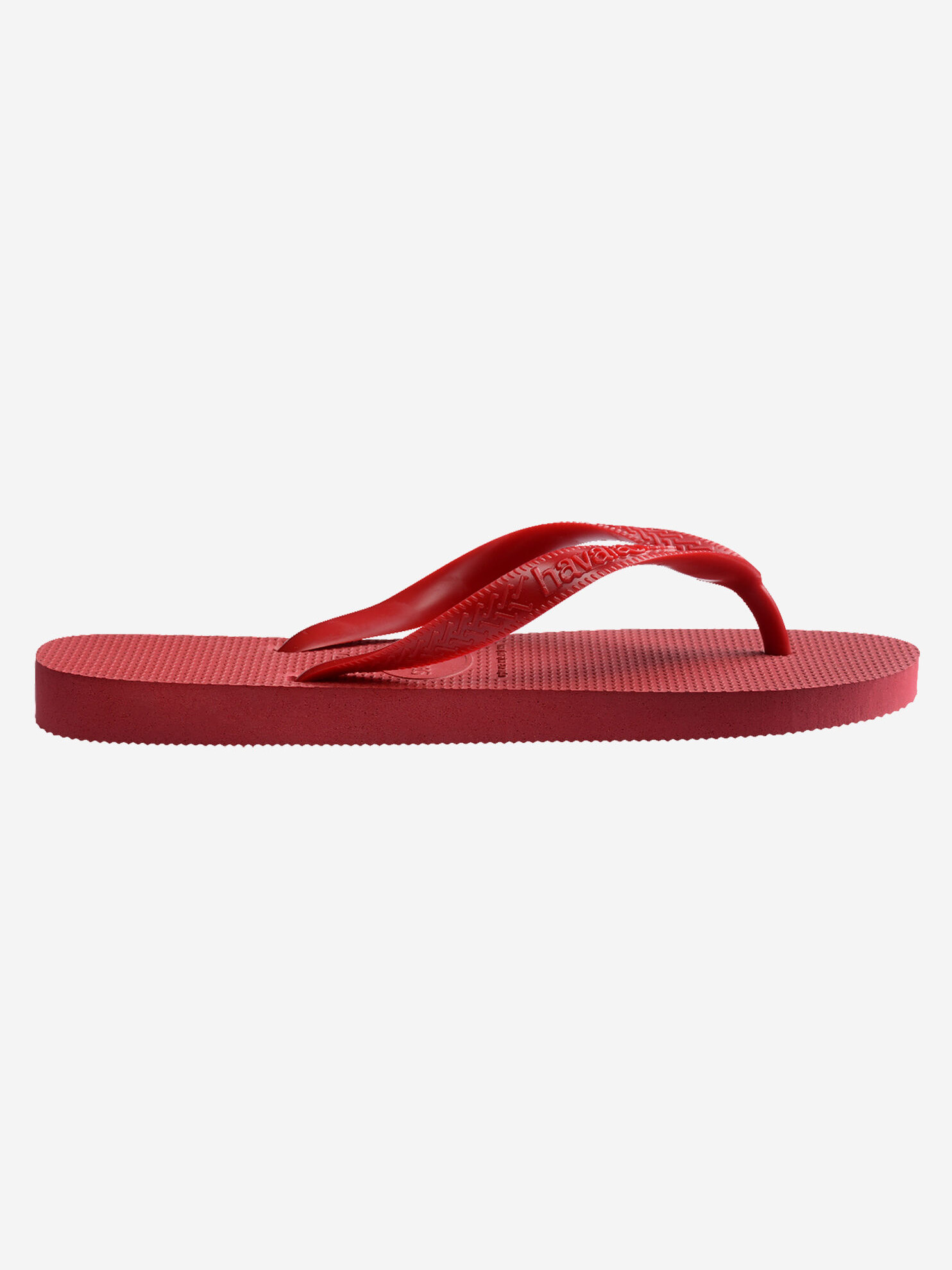 Havaianas Top 4. Een klein accent dat alles verandert. Deze rode slippers brengen warmte en energie in je look. Je schuif...