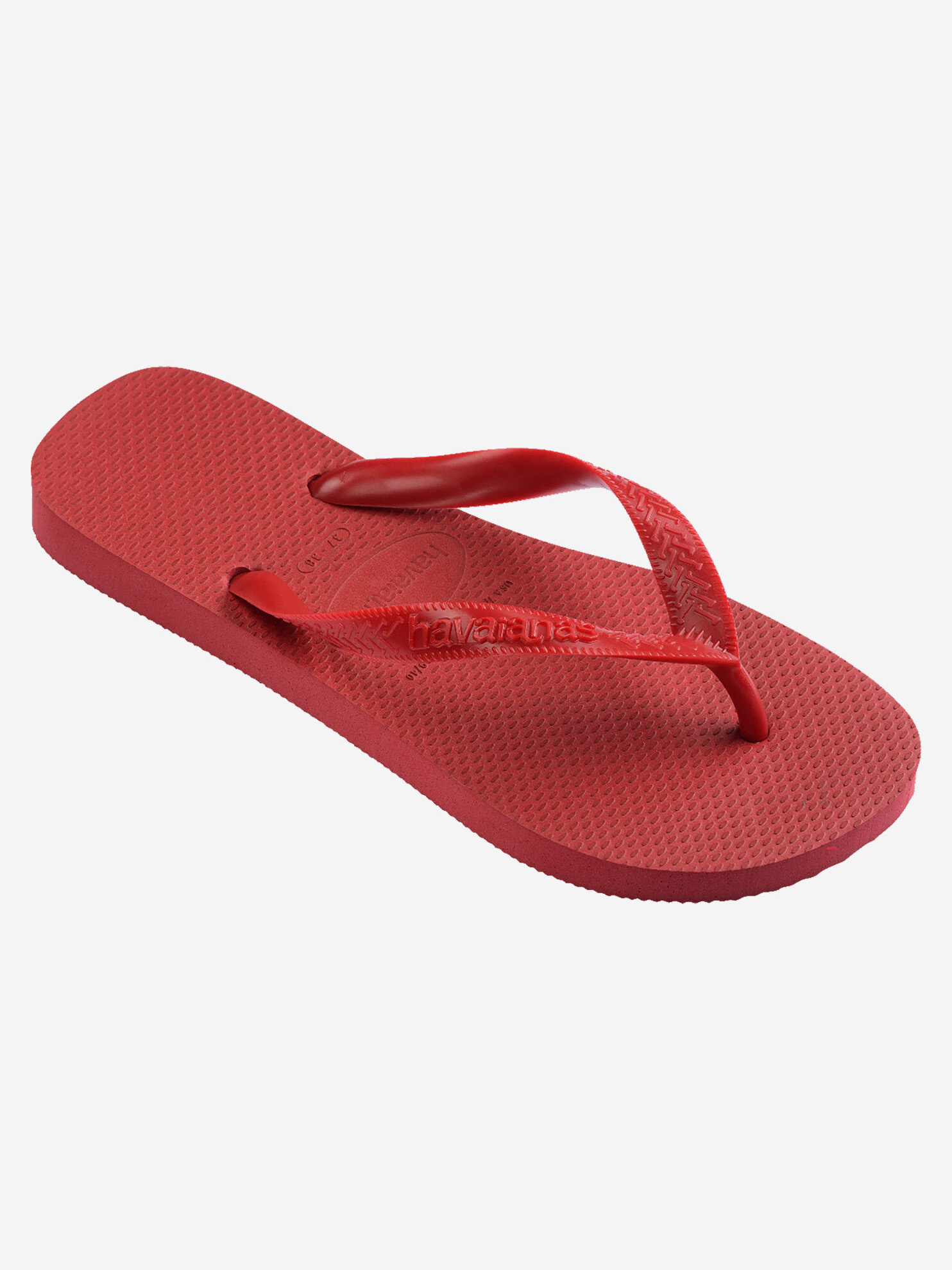 Havaianas Top 3. Een klein accent dat alles verandert. Deze rode slippers brengen warmte en energie in je look. Je schuif...