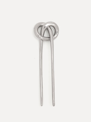 Haarpin. Van los naar samen in één beweging. Deze haarpin maakt het makkelijk om je haar snel op te steken, met een knoop...