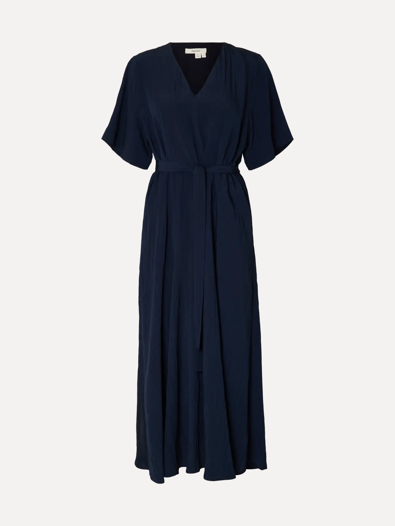 Selected maxi dress Iona 2. A maxi dress that moves effortlessly with you, creating a soft flow with every step. It carri...