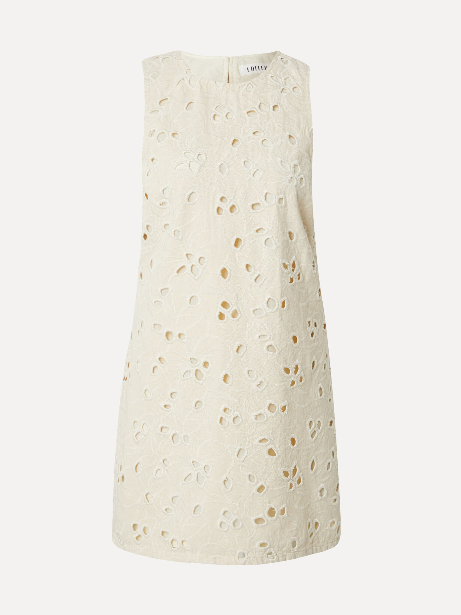 Edited robe broderie Nicky 2. Léger et parfait pour les journées ensoleillées. La broderie ajourée apporte une texture lu...