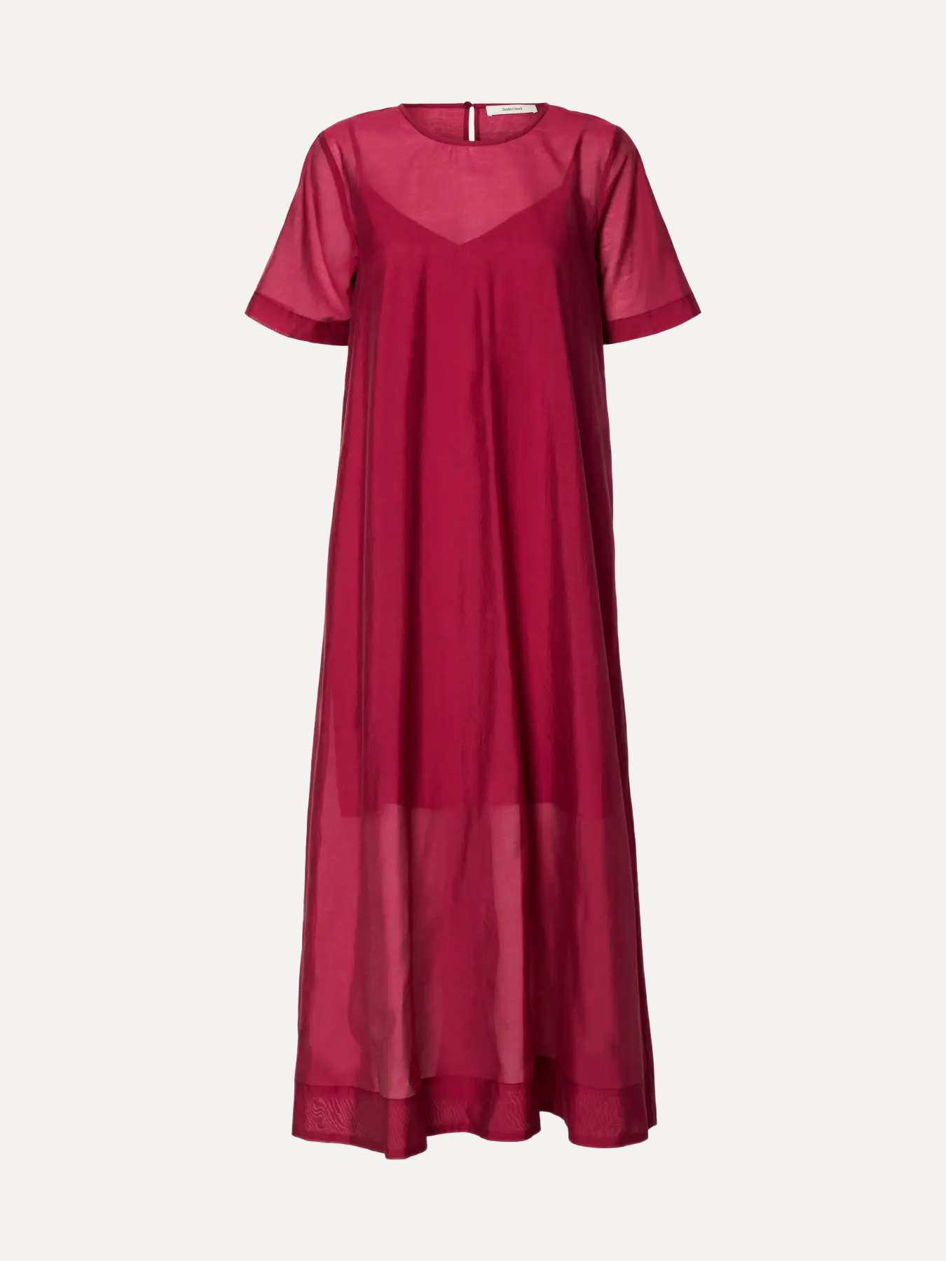 Selected robe en organza Iris 2. La couche en organza transparente accompagne chaque mouvement et capte la lumière à chaq...