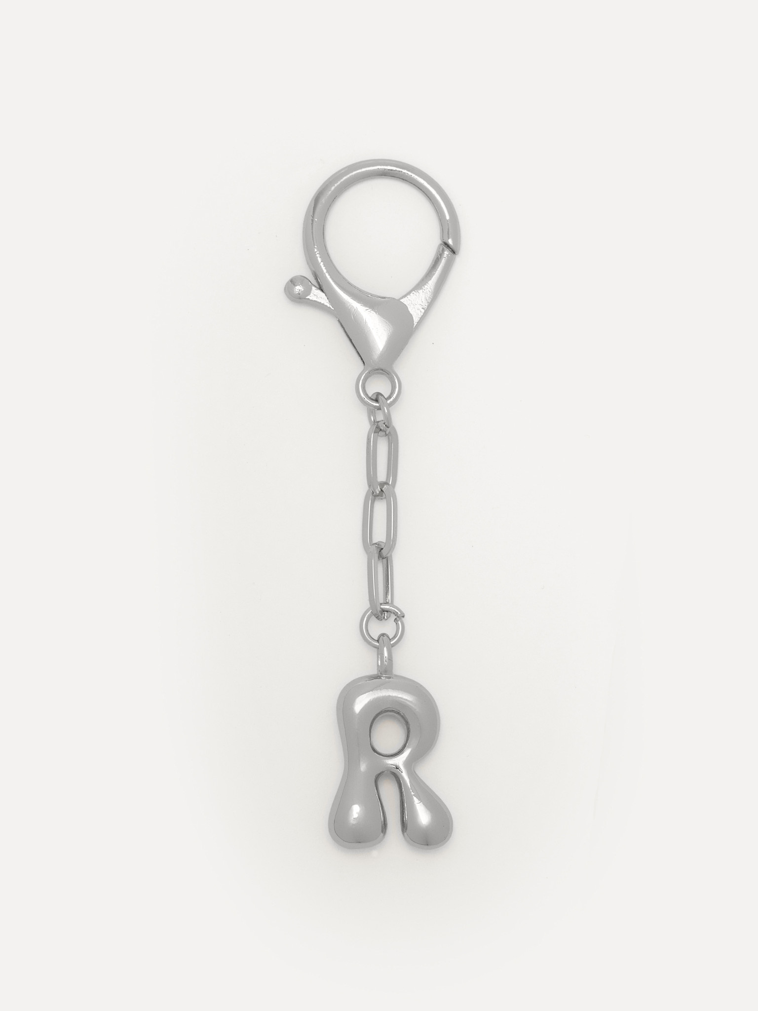 Les Soeurs Key Chain Balloon Letter 4. Something small, with meaning. This letter makes it personal, as if you carry a pi...
