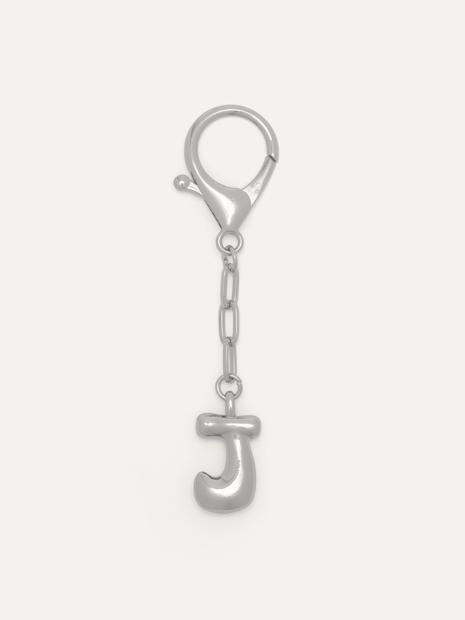 Les Soeurs Key Chain Balloon Letter 10. Something small, with meaning. This letter makes it personal, as if you carry a p...