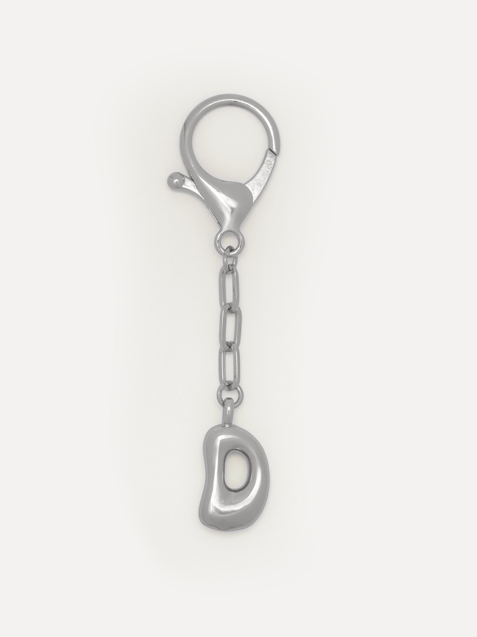 Les Soeurs Key Chain Balloon Letter 11. Something small, with meaning. This letter makes it personal, as if you carry a p...