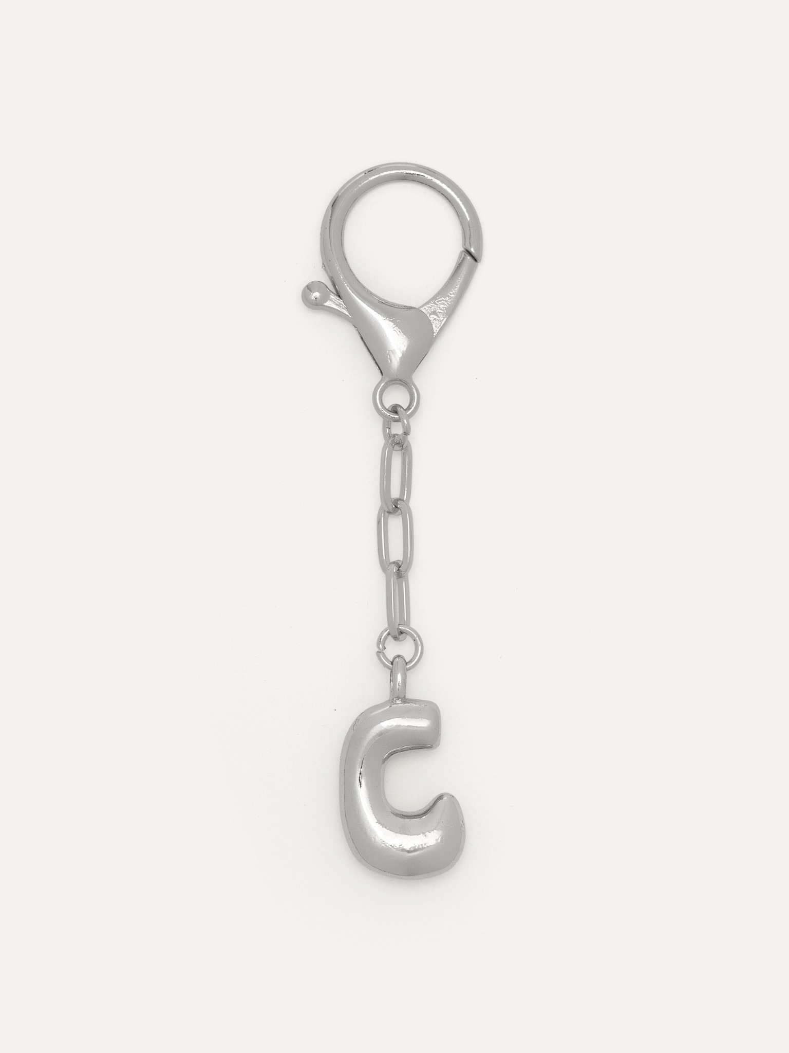 Les Soeurs Key Chain Balloon Letter 12. Something small, with meaning. This letter makes it personal, as if you carry a p...