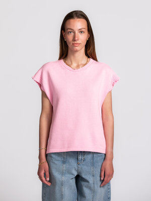 Pull Mellie. Ce pull sans manches associe une sensation de légèreté à une teinte rose fraîche qui attire l’attention sans...
