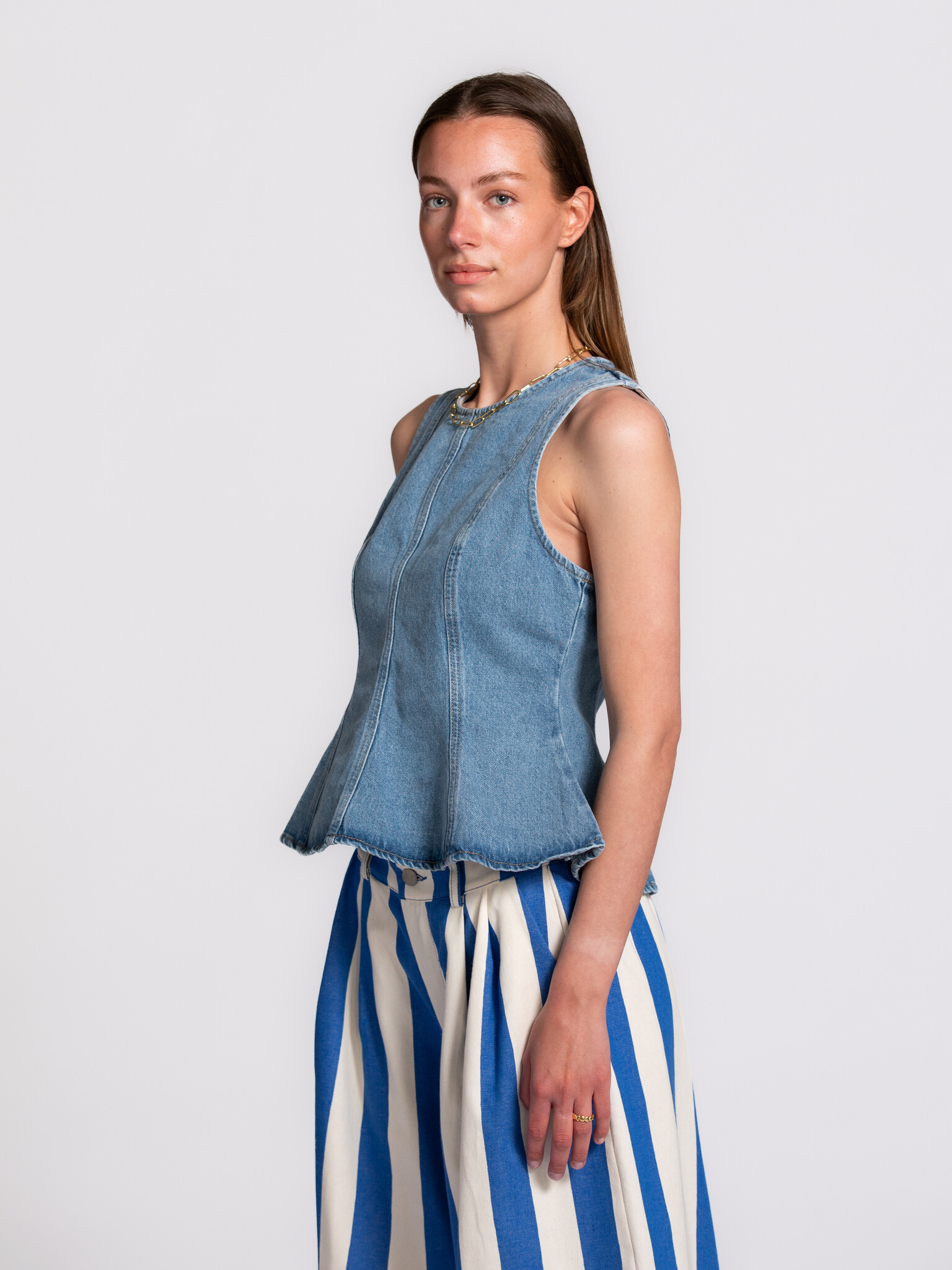 Edited denim top Brenda 1. A denim moment, with its fitted shape and subtle flare gives this top a beautiful look that mo...