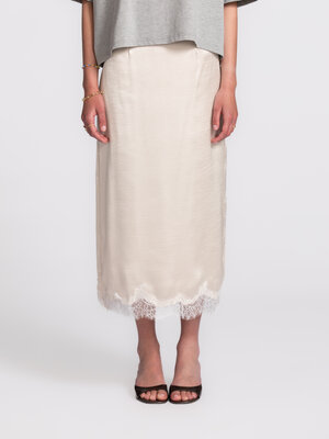 Skirt Celia. Elegance, with a romantic touch. The fluid fabric and lace trim create a refined balance between softness an...