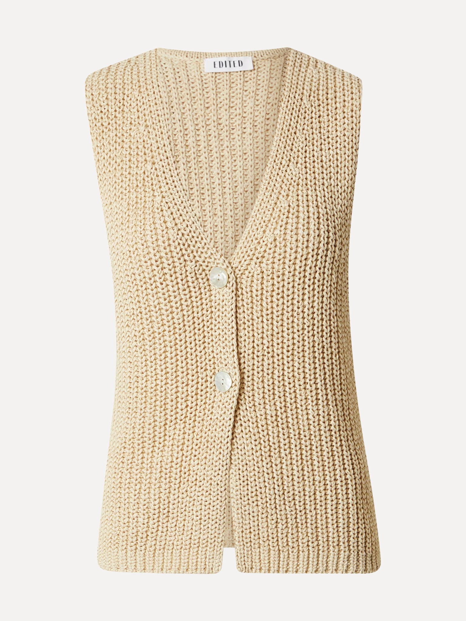 Edited knitted cardigan Nadja 2. The loose knit structure and natural feel give this cardigan a subtle bohemian touch. Th...