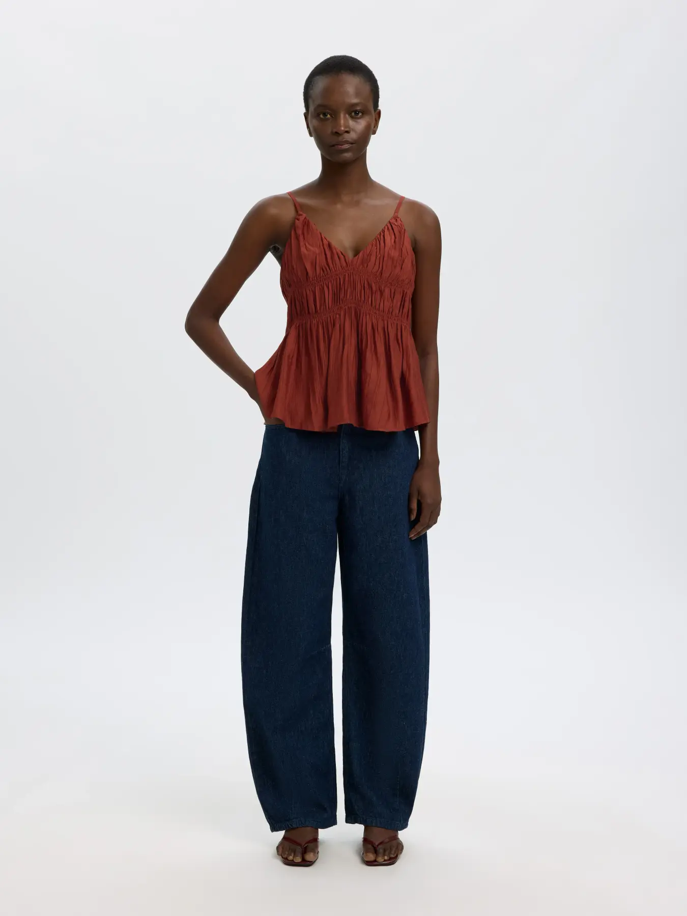 Selected smocked top Jackie 5. The charm lies in the details. The smocked finish gives this top a soft sense of movement ...