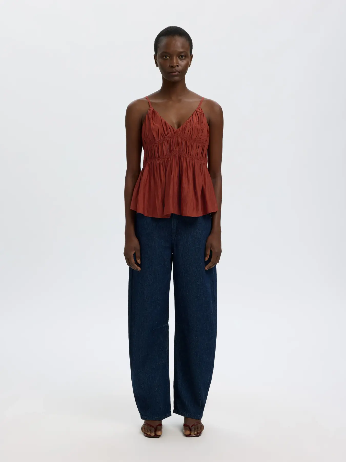 Selected smocked top Jackie 3. The charm lies in the details. The smocked finish gives this top a soft sense of movement ...