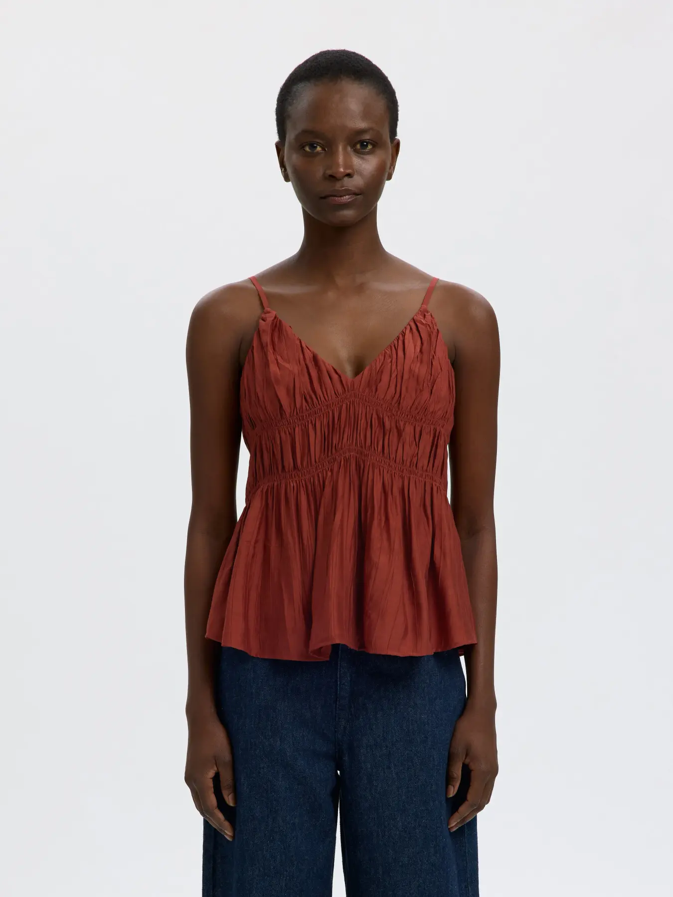 Selected smocked top Jackie 2. The charm lies in the details. The smocked finish gives this top a soft sense of movement ...