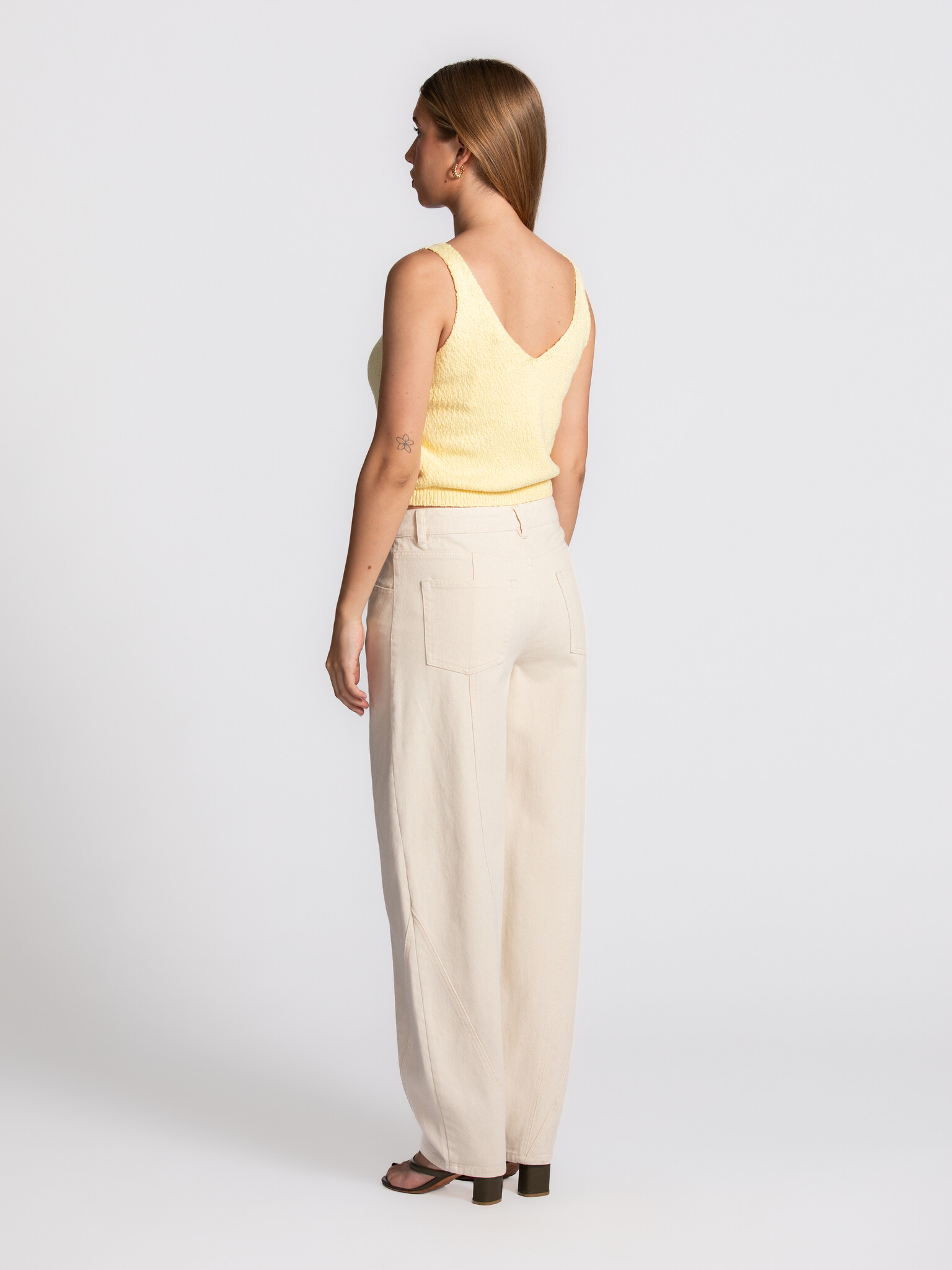 Edited knitted top  Sana 5. A touch of sunshine. The soft butter-yellow shade and knitted texture bring an instant touch ...