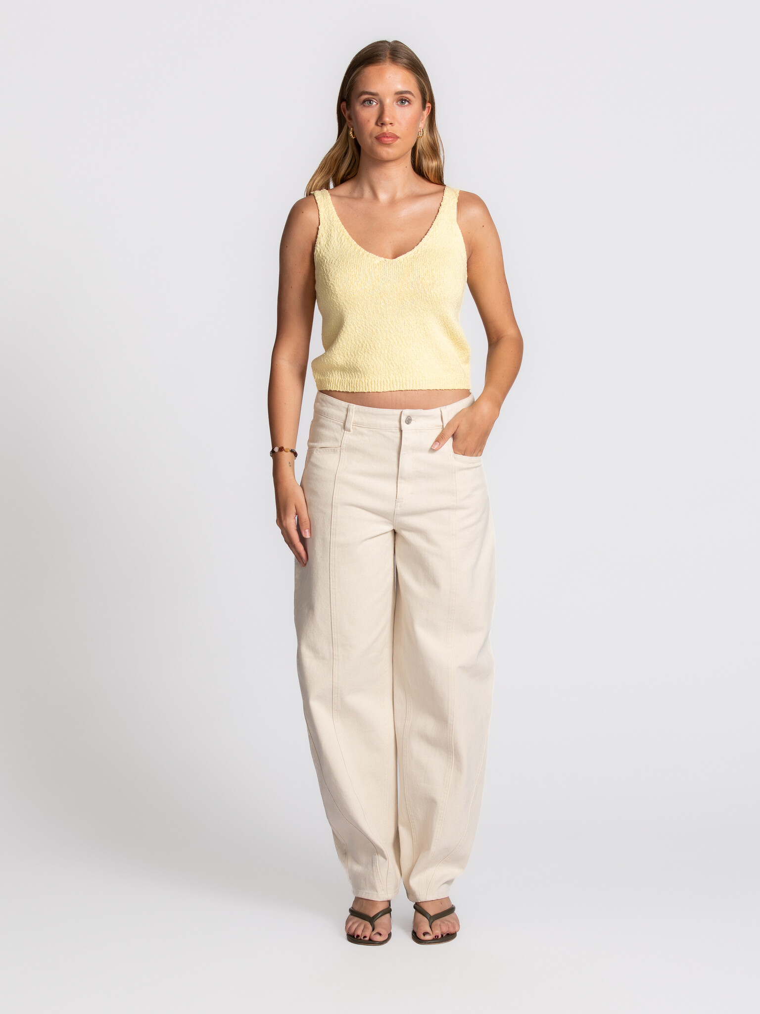 Edited knitted top  Sana 3. A touch of sunshine. The soft butter-yellow shade and knitted texture bring an instant touch ...