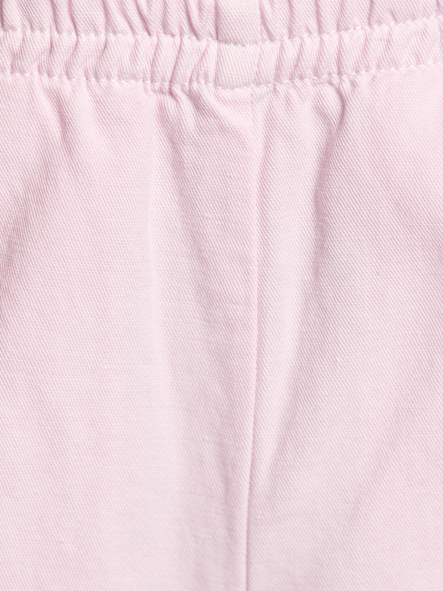 American Vintage pantalon coupe large Namaz 3. Pink comfort. La coupe ample et la douce teinte rose donnent à ce pantalon...