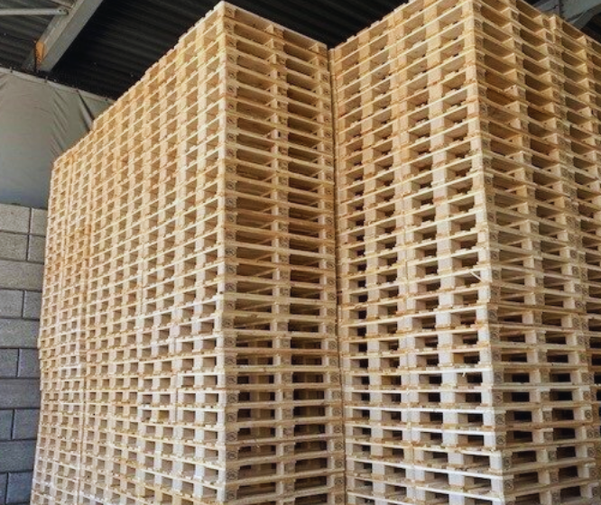 Different stacked wooden pallets