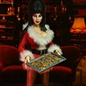 NECA Elvira: Very Scary Xmas Elvira 8 inch Clothed Action Figure NECA Elvira: Very Scary Xmas Elvira 8 inch Clothed Action Figure