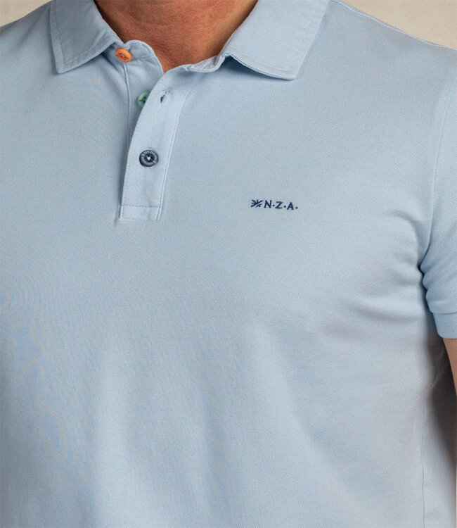 New Zealand Auckland 2026 actie polo sky blue lichtblauw met gekleurde knopen