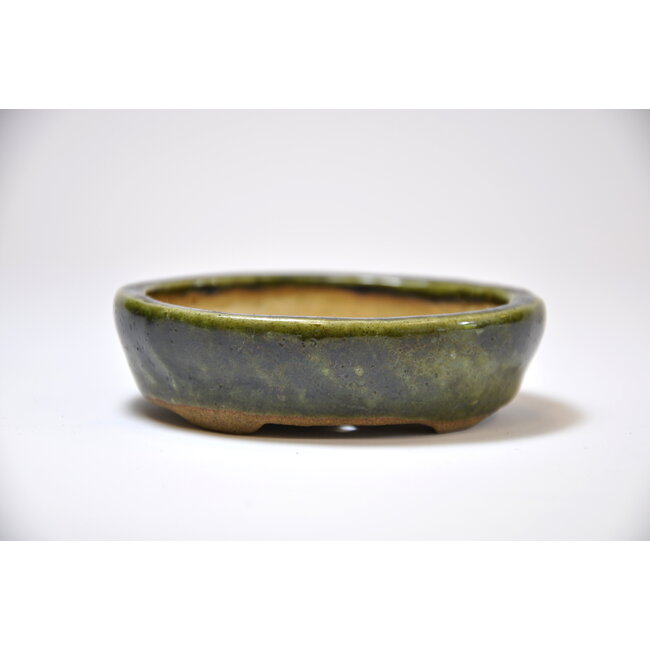 Oval green  pot - 80 x 68 x 21 mm