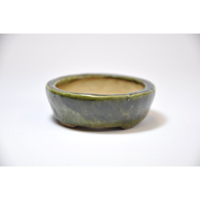 Oval green  pot - 80 x 68 x 21 mm