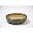 Oval green  pot - 80 x 68 x 21 mm