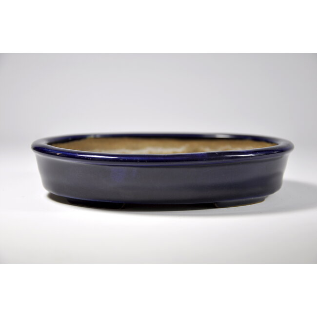 Oval blue glazed  pot - 155 x 129 x 30 mm