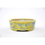 Oval hand-painted yellow glazed  pot - 150 x 112 x 40 mm