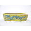 Oval hand-painted yellow glazed  pot - 150 x 112 x 40 mm