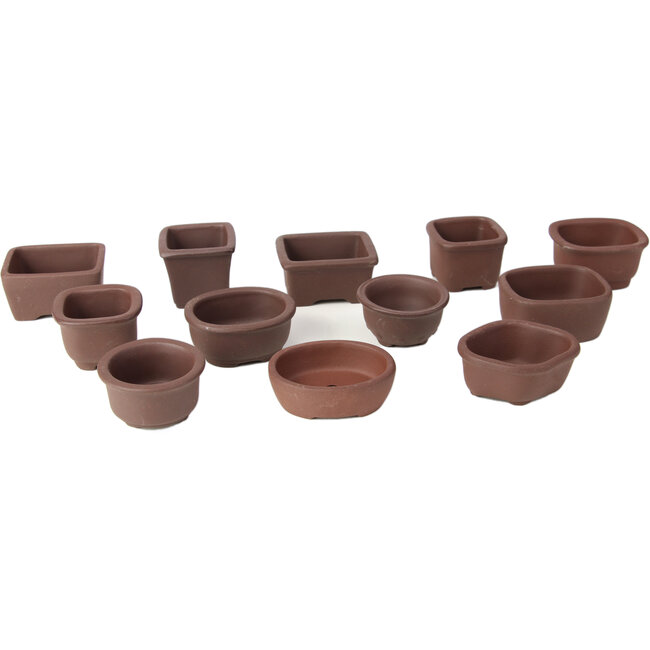 Set de 12 macetas de bonsái pequeñas sin esmaltar de entre 40 y 55 mm de Seto Yaki, Japón.