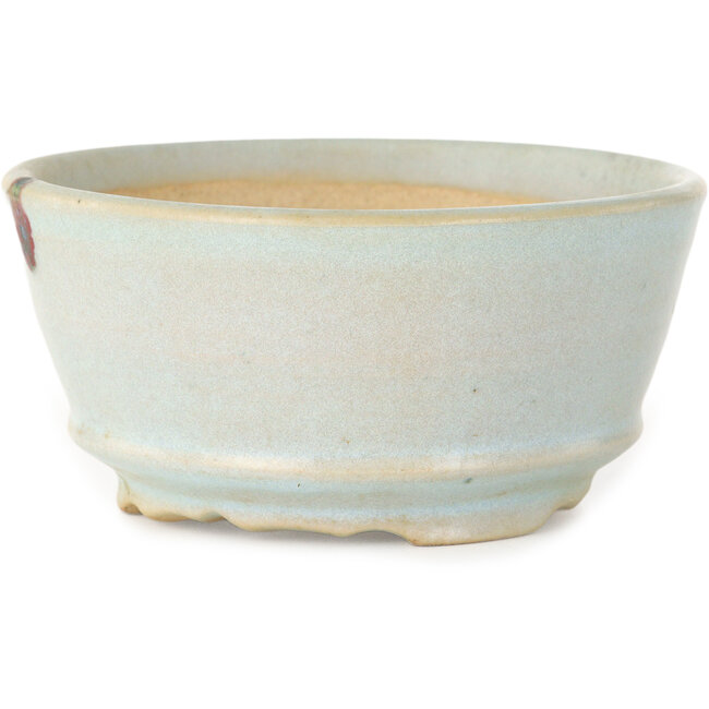 Ronde, lichtblauwe bonsaipot met een rode stip van Issho - 110 x 110 x 55 mm