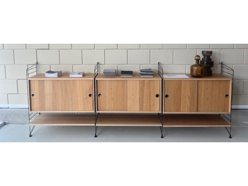 STRING wandkast met schuifdeuren van €2146 voor €950