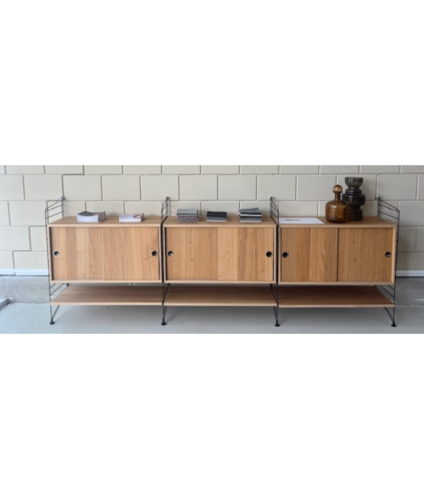 STRING wandkast met schuifdeuren van €2146 voor €950