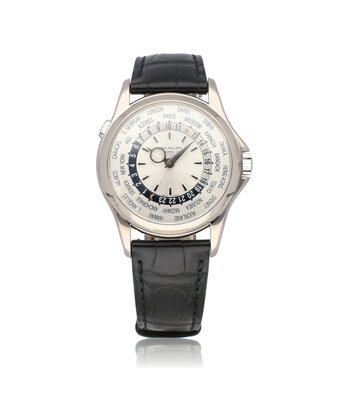 Patek Philippe Complications World Time 40 white gold 2006 + papers | NEW PATEK STRAP