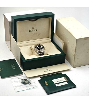 Rolex Submariner Date 40 steel - yellow gold black ceramic 2016 box + papers
