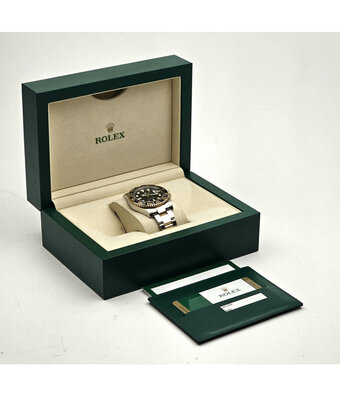 Rolex GMT-Master II 40 steel - yellow gold ceramic black 2014 box + papers