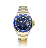 Rolex Submariner Date 40 steel - gold blue / bluesy Oyster 2006 + papers