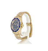 Rolex Submariner Date 40 NEW ROLEX SERVICE | 1994 + papers | gold blue / bluesy / jeans Oyster
