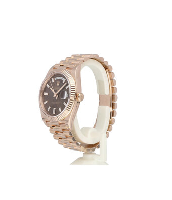Rolex Day-Date 40 rose gold choco diamond / baguette President 2023 box + papers