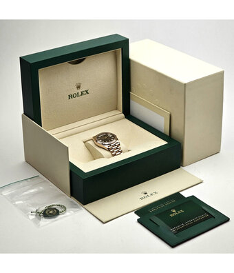 Rolex Day-Date 40 rose gold choco diamond / baguette President 2023 box + papers