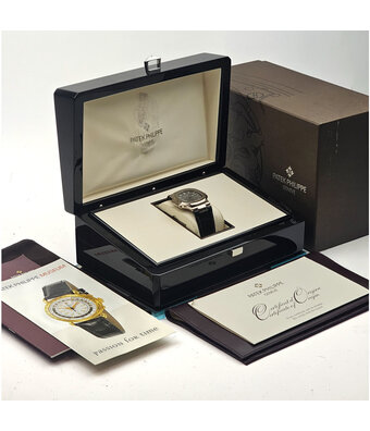 Patek Philippe Nautilus  40 white gold grey / slate 2008 box + papers