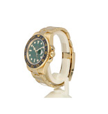 Rolex GMT-Master II 40 money green 2006 + box | yellow gold ceramic