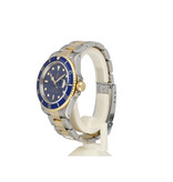 Rolex Submariner Date 40 NEW ROLEX SERVICE - 2003 B+P | steel - gold blue / bluesy