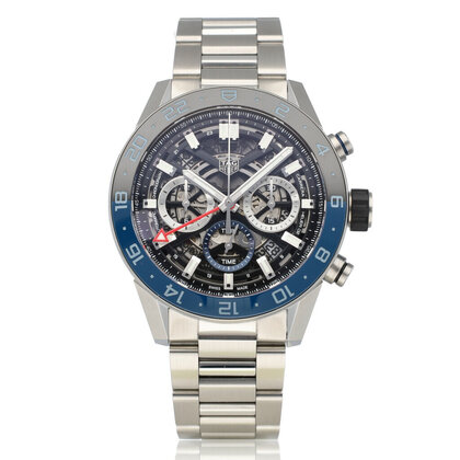 Carrera Calibre Heuer 02 Chronograph GMT 45 steel skeleton black/blue bezel 2026 B+P