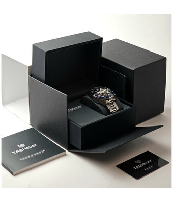 TAG Heuer Carrera Calibre Heuer 02 Chronograph GMT 45 steel skeleton black/blue bezel 2026 B+P