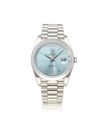 Rolex Day-Date 40 2017 box + papers | platinum ice blue diamond / baguette domed President