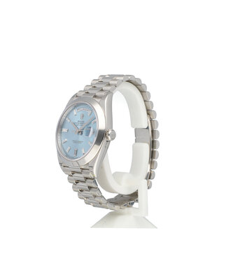 Rolex Day-Date 40 2017 box + papers | platinum ice blue diamond / baguette domed President