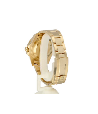 Rolex GMT-Master II 40 money green 2006 + box | yellow gold ceramic