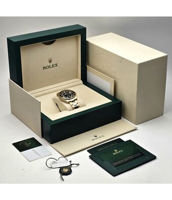 Rolex Submariner Date 41 NEW ROLEX SERVICE - 2021 B+P | yellow gold black Oyster