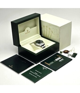 Rolex Milgauss 40 - 2013 box + papers | steel black orange - green - GV Oyster
